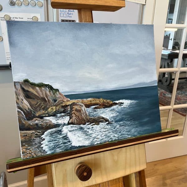 Granite cliff over the ocean on easel