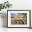 Blank picture frame mockup in scandinavian style over white wall with green eucalyptus in vase